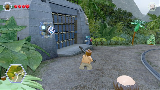 Shoot the blue shield as Barry and enter the darkened garage as Timmy - Carnivore Territory | Jurassic Park - secrets in free roam - Jurassic Park - secrets in free roam - LEGO Jurassic World Game Guide & Walkthrough