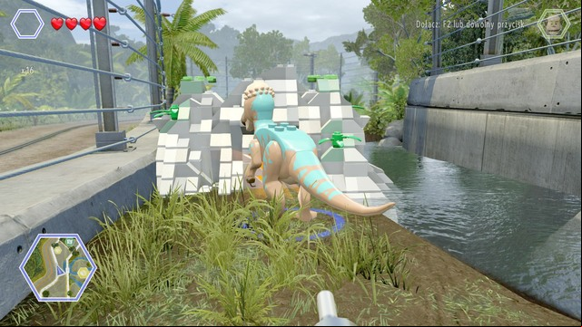 Walk to the left side as pachycephalosaurus and destroy the road barricade shown on the picture - Carnivore Territory | Jurassic Park - secrets in free roam - Jurassic Park - secrets in free roam - LEGO Jurassic World Game Guide & Walkthrough