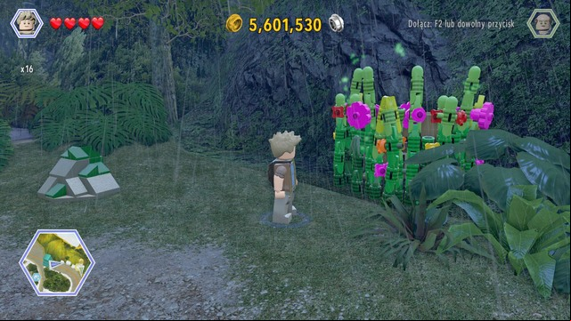 After getting to the road, go to the plants shown on the picture and cut them as Grant - Carnivore Territory | Jurassic Park - secrets in free roam - Jurassic Park - secrets in free roam - LEGO Jurassic World Game Guide & Walkthrough