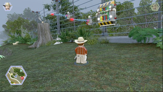 Third one can be found on the trunk on the left side - Carnivore Territory | Jurassic Park - secrets in free roam - Jurassic Park - secrets in free roam - LEGO Jurassic World Game Guide & Walkthrough