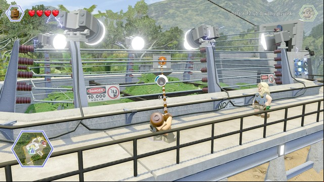 To get the golden brick, stand in the place shown on the picture (its the only place where you can shoot the rope) - Raptor Territory | Jurassic Park - secrets in free roam - Jurassic Park - secrets in free roam - LEGO Jurassic World Game Guide & Walkthrough