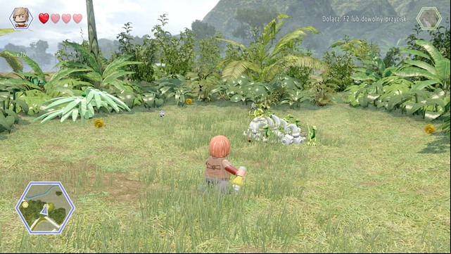 As Eric, walk to the compsognathuses and throw tyrannosaurus smell at them - Triceratops Territory | Jurassic Park - secrets in free roam - Jurassic Park - secrets in free roam - LEGO Jurassic World Game Guide & Walkthrough