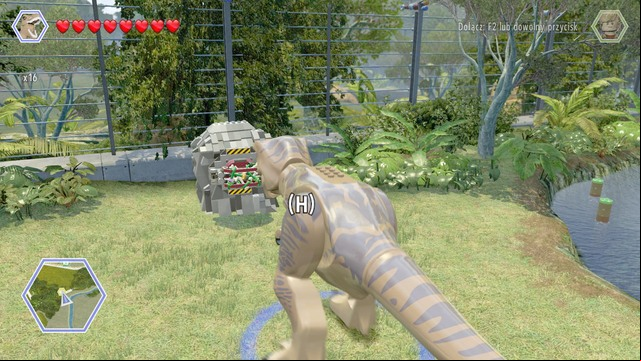 As tyrannosaurus, walk to the brick object shown on the picture and use your strength to destroy it - Triceratops Territory | Jurassic Park - secrets in free roam - Jurassic Park - secrets in free roam - LEGO Jurassic World Game Guide & Walkthrough