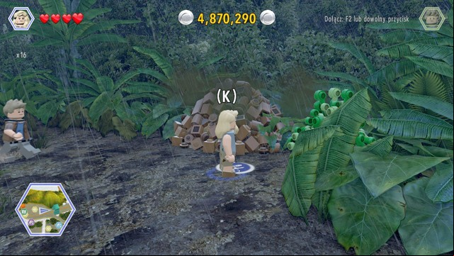 Walk to the dinosaurs excrements and, as Ellie, dig up part of the golden brick - Tyrannosaurus Enclosure | Jurassic Park - secrets in free roam - Jurassic Park - secrets in free roam - LEGO Jurassic World Game Guide & Walkthrough