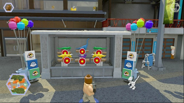 Walk to the stall as a character with gunfire and shoot at the shields - Main Street | Jurassic World - secrets in free roam - Jurassic World - secrets in free roam - LEGO Jurassic World Game Guide & Walkthrough