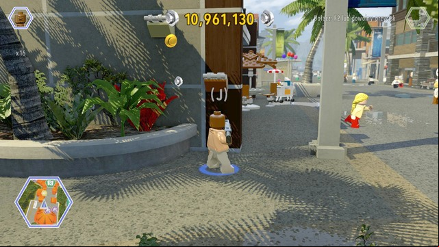 Walk behind the buildings, from the communications center side, and use the rods shown on the picture - Main Street | Jurassic World - secrets in free roam - Jurassic World - secrets in free roam - LEGO Jurassic World Game Guide & Walkthrough