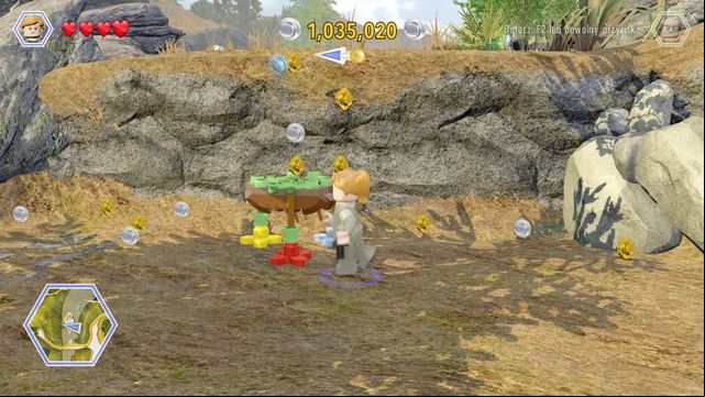 After jumping at the hill, approach the tripod as Billy and take the photo - Mobile Lab Site | Jurassic Park - The Lost World - secrets in free roam - Jurassic Park - The Lost World - secrets in free roam - LEGO Jurassic World Game Guide & Walkthrough