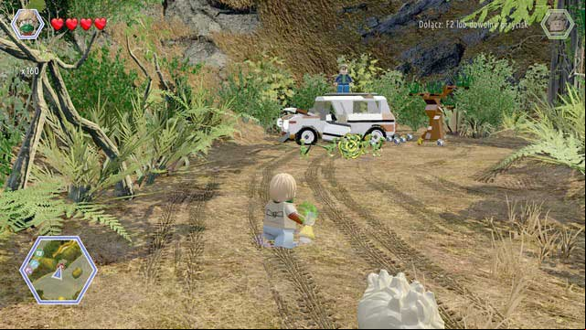 Walk to the car as Eric and throw the tyrannosaurus smell at the compsognathuses - Hunting Plains | Jurassic Park - The Lost World - secrets in free roam - Jurassic Park - The Lost World - secrets in free roam - LEGO Jurassic World Game Guide & Walkthrough