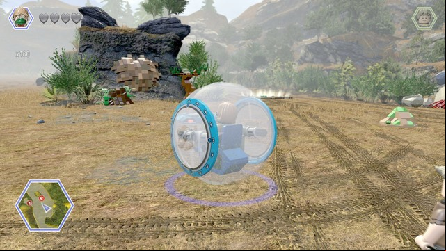 Use the gyrosphere to ride on the jump and destroy the rock shown on the picture - Hunting Plains | Jurassic Park - The Lost World - secrets in free roam - Jurassic Park - The Lost World - secrets in free roam - LEGO Jurassic World Game Guide & Walkthrough