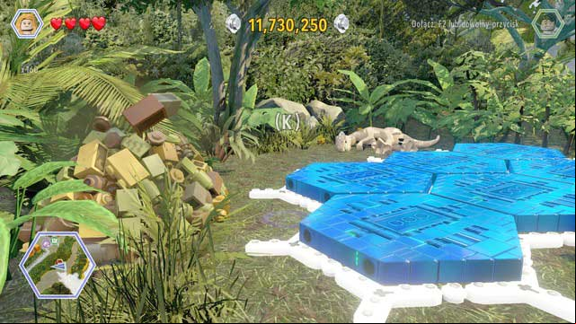 Walk to the excrements and, as Ellie, get the item from them and learn what is needed for healing the raptor - Long Grass | Jurassic Park - The Lost World - secrets in free roam - Jurassic Park - The Lost World - secrets in free roam - LEGO Jurassic World Game Guide & Walkthrough
