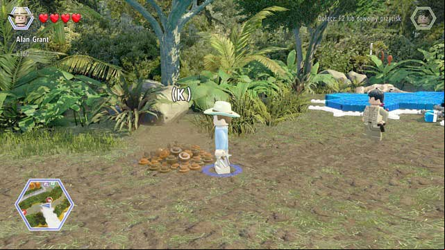 As Grant, walk to the pile of ground and dig up the brick from it - Long Grass | Jurassic Park - The Lost World - secrets in free roam - Jurassic Park - The Lost World - secrets in free roam - LEGO Jurassic World Game Guide & Walkthrough