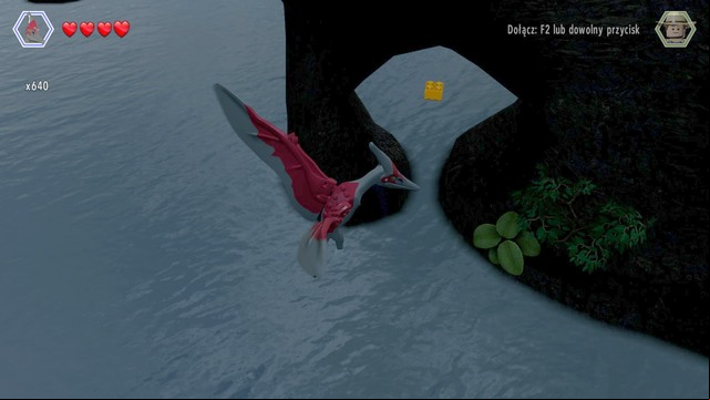Fly under the rock with the required altitude to receive another golden brick - Isla Sorna Aviary | Jurassic Park III - secrets in free roam - Jurassic Park III - secrets in free roam - LEGO Jurassic World Game Guide & Walkthrough