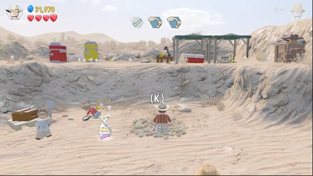 The second of the skeletons, of the three, is on the left - Prologue | Jurassic Park - walkthrough - Jurassic Park - walkthrough - LEGO Jurassic World Game Guide & Walkthrough