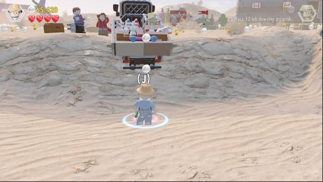 After you have smashed all of the objects, as Ellie, approach the truck shown in the screenshot and take a jump to scatter the bricks on the bed of the truck - Prologue | Jurassic Park - walkthrough - Jurassic Park - walkthrough - LEGO Jurassic World Game Guide & Walkthrough
