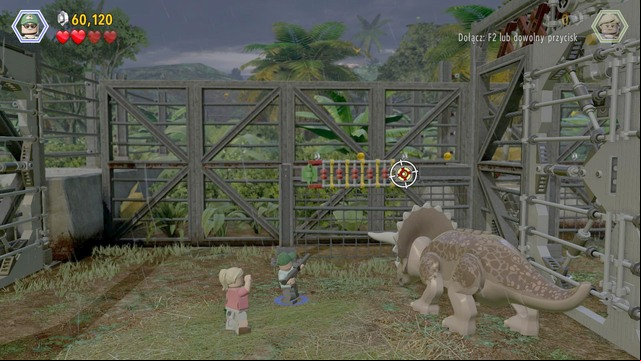 After you have opened the gate, as the park employee, and fire your gun at the target shown in the screenshot - Welcome to Jurassic Park | Jurassic Park - walkthrough - Jurassic Park - walkthrough - LEGO Jurassic World Game Guide & Walkthrough