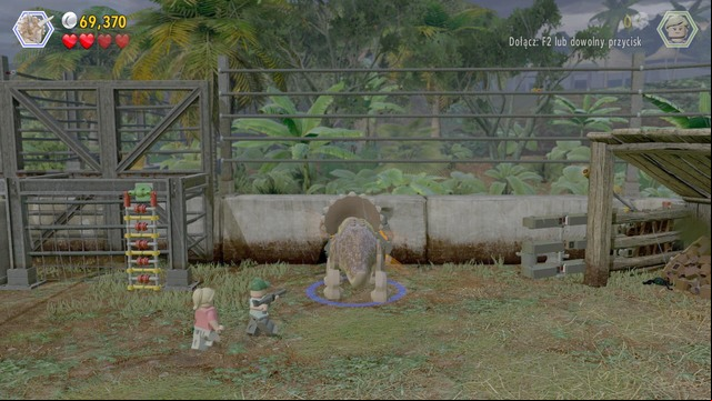 After you open the gate, switch to the triceratops and approach the orange element shown in the screenshot - Welcome to Jurassic Park | Jurassic Park - walkthrough - Jurassic Park - walkthrough - LEGO Jurassic World Game Guide & Walkthrough