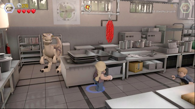 After you make it through the gate and see a short cutscene, as Murphy, approach the spot shown in the screenshot - Visitor center | Jurassic Park - walkthrough - Jurassic Park - walkthrough - LEGO Jurassic World Game Guide & Walkthrough