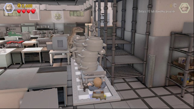 Atop the shelf, walk over to the venting shaft and, at the other side, move another trolley towards the dinosaur, which will make way for Murphy - Visitor center | Jurassic Park - walkthrough - Jurassic Park - walkthrough - LEGO Jurassic World Game Guide & Walkthrough