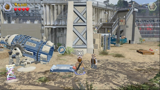 After you destroy the car, approach it and build the pig launcher - Welcome to the Jurassic World | Jurassic World - walkthrough - Jurassic World - walkthrough - LEGO Jurassic World Game Guide & Walkthrough