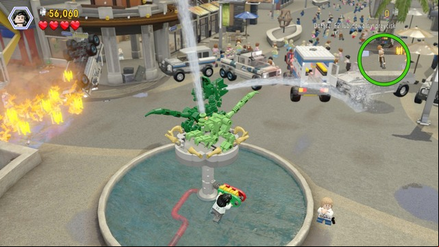 After you have restored power, switch to Zara and build an arm, with the bricks at the fountain - Under Attack | Jurassic World - walkthrough - Jurassic World - walkthrough - LEGO Jurassic World Game Guide & Walkthrough