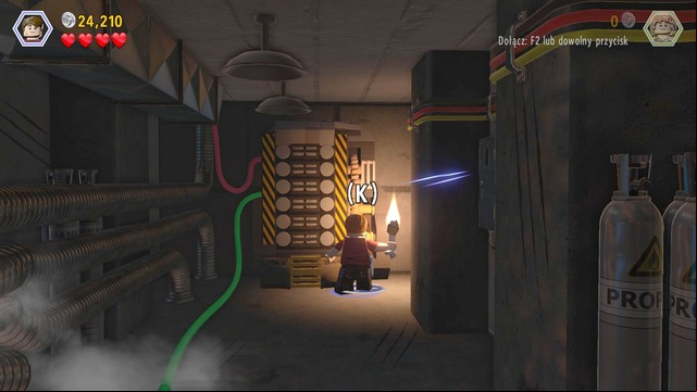As Zach, enter the dark room and defend against the attacking velociraptor - Main Street Showdown | Jurassic World - walkthrough - Jurassic World - walkthrough - LEGO Jurassic World Game Guide & Walkthrough