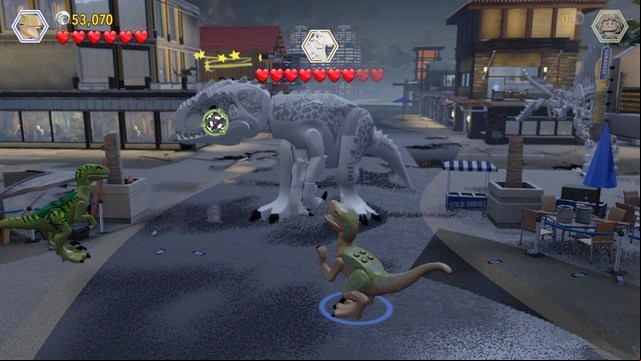 Use the scattered bricks to build the second part of the weapon and use it - Main Street Showdown | Jurassic World - walkthrough - Jurassic World - walkthrough - LEGO Jurassic World Game Guide & Walkthrough