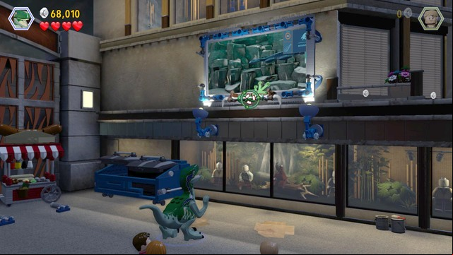 As velociraptor, approach the right side and follow the scent - Main Street Showdown | Jurassic World - walkthrough - Jurassic World - walkthrough - LEGO Jurassic World Game Guide & Walkthrough