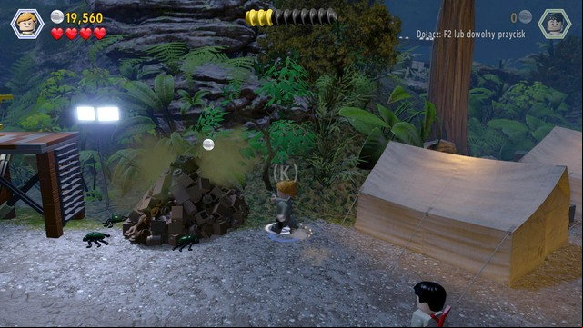 After you fight back the InGen, as Sarah, approach the feces next to the tent, dig up the horn and return to the dinosaur - InGen Arrival | Jurassic Park - The Lost World - walkthrough - Jurassic Park - The Lost World - walkthrough - LEGO Jurassic World Game Guide & Walkthrough