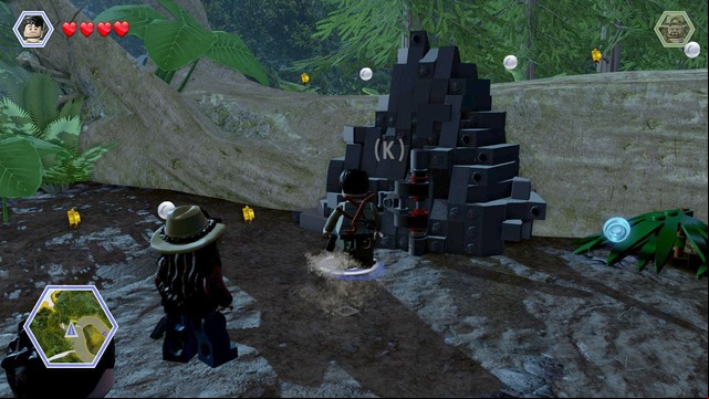 After you follow the turquoise studs to the spot shown in the screenshot, switch to Nick to smash the obstacle, jump over the tree trunk and go towards the camp - The Hunted | Jurassic Park - The Lost World - walkthrough - Jurassic Park - The Lost World - walkthrough - LEGO Jurassic World Game Guide & Walkthrough