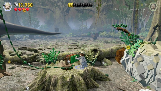 After the battle with the spinosaurus, cut to Paul and pull bricks from the tree trunk, using the rope - Spinosaurus | Jurassic Park III - walkthrough - Jurassic Park III - walkthrough - LEGO Jurassic World Game Guide & Walkthrough