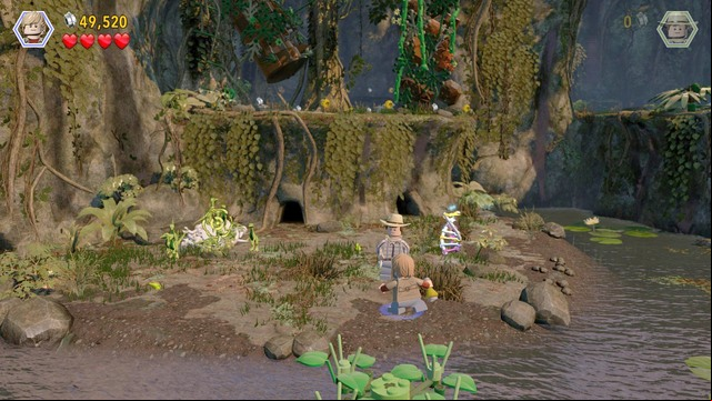 Jump over the water, switch to Eric and throw the tyrannosaur scent towards the dinosaurs to drive them away - Eric Kirby | Jurassic Park III - walkthrough - Jurassic Park III - walkthrough - LEGO Jurassic World Game Guide & Walkthrough