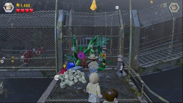 After you walk inside, as Grant, approach the plants in the way and cut them down - Birdcage | Jurassic Park III - walkthrough - Jurassic Park III - walkthrough - LEGO Jurassic World Game Guide & Walkthrough