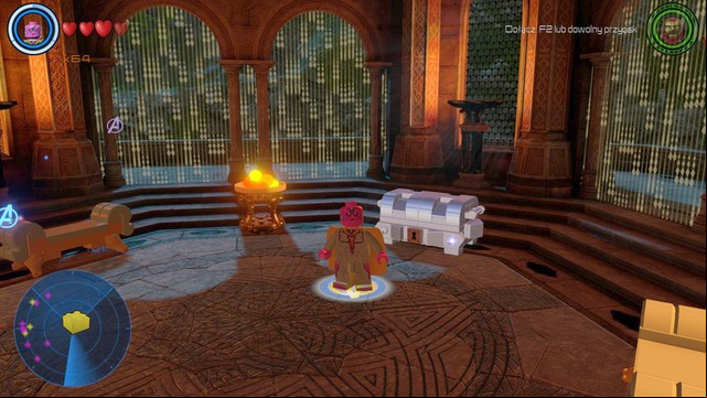 Once inside you can switch your character to Iron Man and scan the area in order to lower the force field or simply use rockets to destroy the silver container and gain access to another golden brick - Golden bricks - Asgard - secrets - LEGO Marvels Avengers - Game Guide and Walkthrough