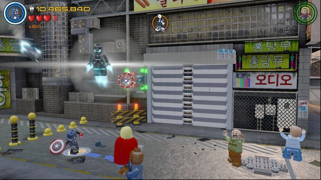 After constructing the first part of the device, walk to the left side where you will find a red car - Minikits - Korea Prospects - secrets - LEGO Marvels Avengers - Game Guide and Walkthrough