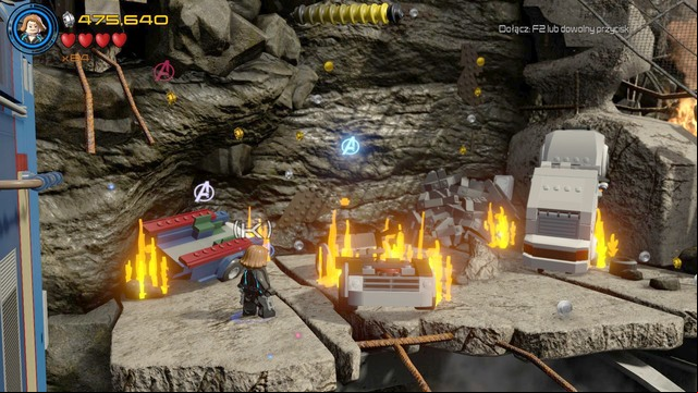Use the handles after reaching the hanging train to jump as Black Widow to the other side - Minikits - Rise of Ultron - secrets - LEGO Marvels Avengers - Game Guide and Walkthrough