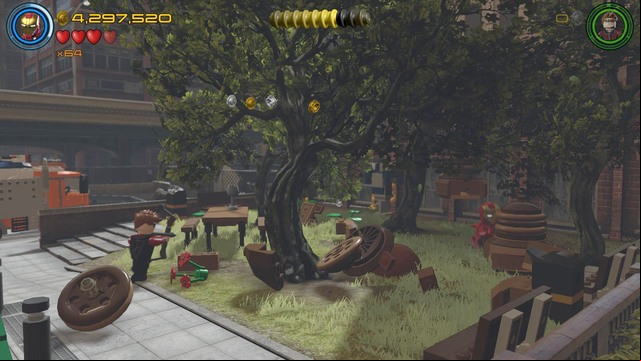 Walk to the right side where you will find acorns hanging from the trees - Minikits - Lack of Insight - secrets - LEGO Marvels Avengers - Game Guide and Walkthrough