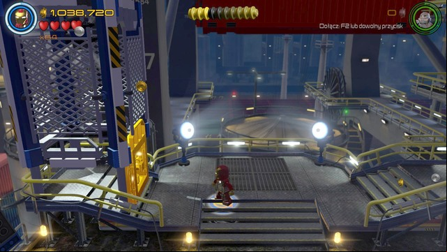 Walk towards the left side and use Iron Mans lasers to burn the golden door - Minikits - Ready, A.I.M., Fire - secrets - LEGO Marvels Avengers - Game Guide and Walkthrough