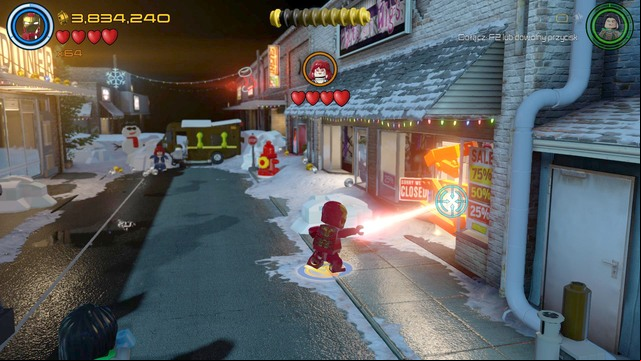 After walking through the blockade, go to the right side before fighting the boss and destroy the golden barricade shown on the picture by using Iron Mans lasers - Characters - Ready, A.I.M., Fire - secrets - LEGO Marvels Avengers - Game Guide and Walkthrough