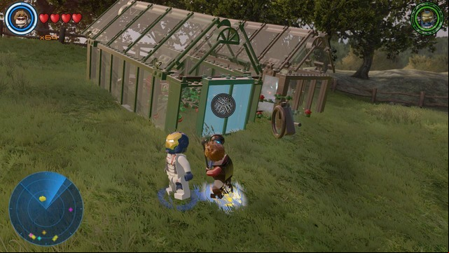 On the right side of the farm you will find two glass houses - Golden bricks - Bartons Farm - secrets - LEGO Marvels Avengers - Game Guide and Walkthrough