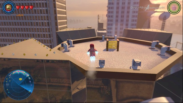 In the place shown on the picture you will find a cover protecting golden wall - Golden bricks - North Manhattan - secrets - LEGO Marvels Avengers - Game Guide and Walkthrough