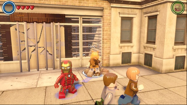 Near the border between northern and central Manhattan you will find a shop with blocked entrance - Golden bricks - Central Manhattan - secrets - LEGO Marvels Avengers - Game Guide and Walkthrough