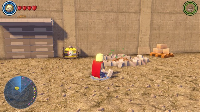 On the other side of the building you will find a pile of ground from which you must dig up bricks as Squirrel Girl - Golden bricks - Southern Manhattan - secrets - LEGO Marvels Avengers - Game Guide and Walkthrough