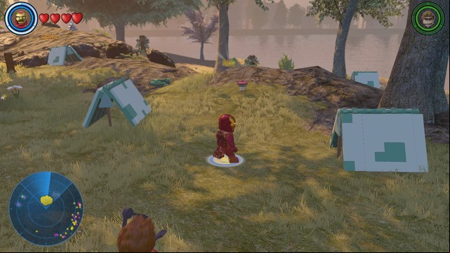 Near Avengers base you will find a park with tents in it - Golden bricks - Southern Manhattan - secrets - LEGO Marvels Avengers - Game Guide and Walkthrough