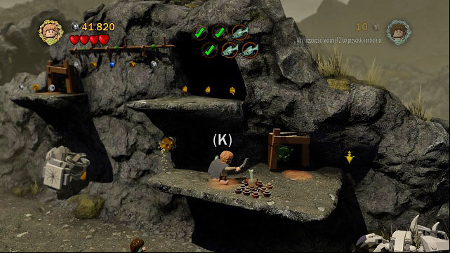 The last one is inside the dark cave above you - Taming Gollum - Walkthrough - Act II - LEGO The Lord of the Rings - Game Guide and Walkthrough