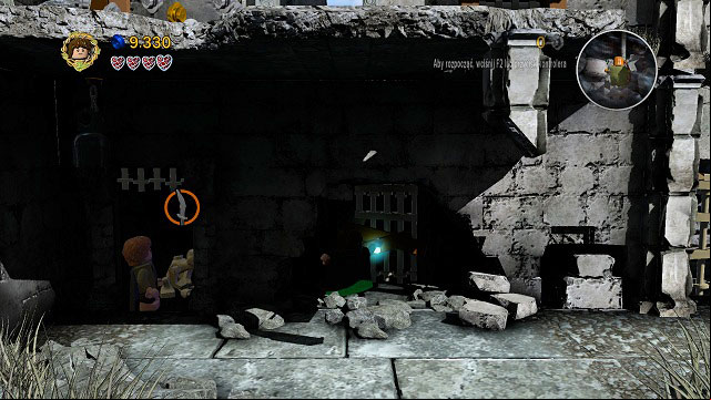 On the tower you should see an Orc with a sword which you will be able to use to free Gollum's hands - Osgiliath - Walkthrough - Act II - LEGO The Lord of the Rings - Game Guide and Walkthrough