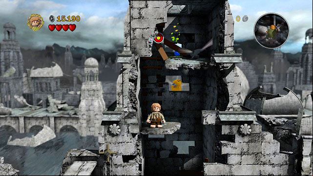 Build a springboard from the LEGO bricks on the ground and use it to reach the first floor of the tower - Osgiliath - Walkthrough - Act II - LEGO The Lord of the Rings - Game Guide and Walkthrough