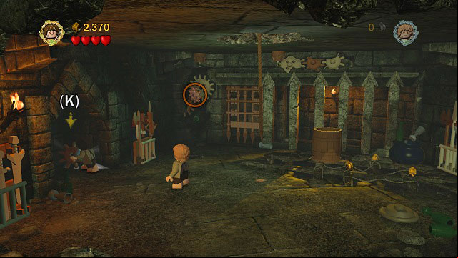 Deal with the Orcs stationed here, switch to Frodo and use his phial to light the portal on the left side of the room - Cirith Ungol - Walkthrough - Act III - LEGO The Lord of the Rings - Game Guide and Walkthrough