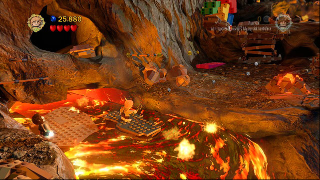 Avoid the fire traps from the prologue and you will reach a rail - Mount Doom - Walkthrough - Act III - LEGO The Lord of the Rings - Game Guide and Walkthrough