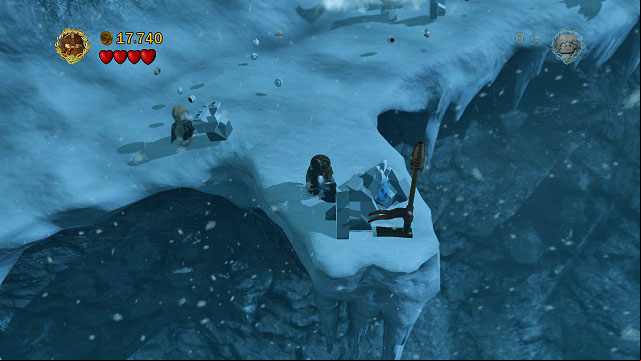 #4 - After crossing the bridge, avoid the strong winds and instead of going up the stairs, move closer to the camera - The of Caradhras - Collectibles - LEGO The Lord of the Rings - Game Guide and Walkthrough