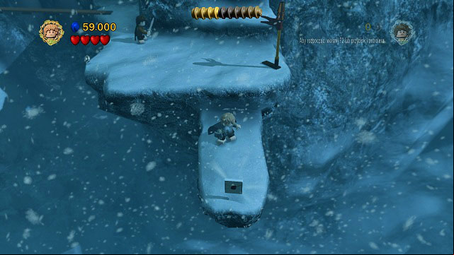 After crossing the bridge, avoid the strong winds and instead of going up the stairs, move towards the camera - The of Caradhras - Collectibles - LEGO The Lord of the Rings - Game Guide and Walkthrough